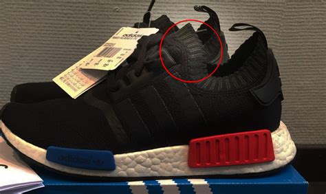 fake vs real adidas nmd|nmd foot plugs.